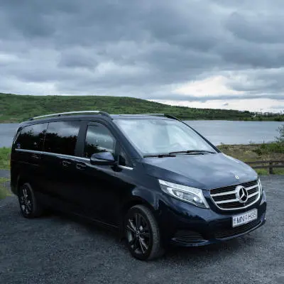 A blue mercedes van